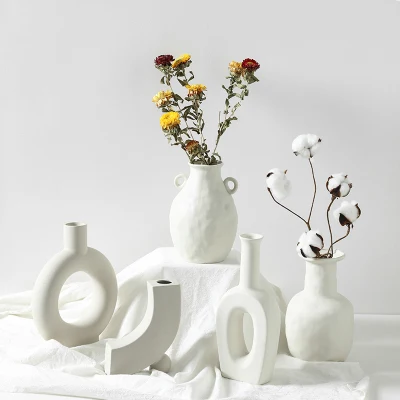 Home Vaso da fiori di lusso di forma irregolare realizzato in porcellana/vetro/ceramica/resina/ceramica